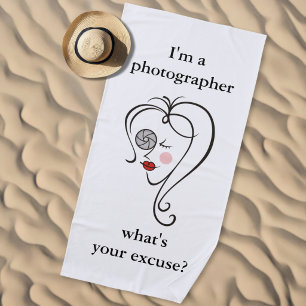 Female photographer beach towel