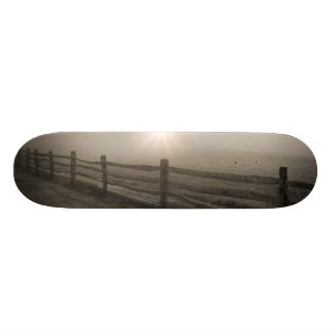 Fence and Sunburst Through Fog near Sharon Skateboard