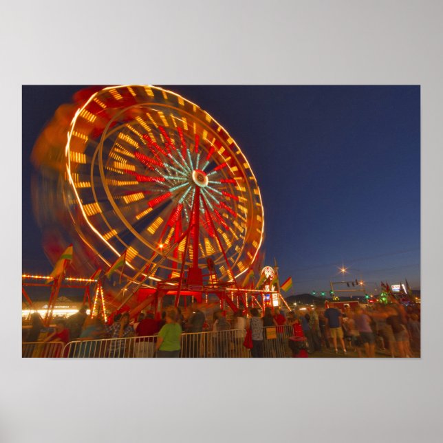 Ferris wheel at dusk at the Northwest Montana Poster (Front)