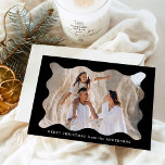 Festive Black Retro Photo Frame Merry Christmas Holiday Card<br><div class="desc">Send festive holiday greetings to your friends and family with this trendy holiday photo card! The simple Christmas card displays your horizontal photo framed in a wavy, black retro-style frame. Personalise the minimal holiday card with a custom greeting (shown as Merry Christmas) and your family name in white lettering. The...</div>