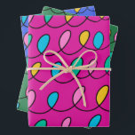 Festive Christmas Lights Pattern PInk Wrapping Paper Sheet<br><div class="desc">This whimsical holiday design features three different coloured backgrounds behind the festive Christmas lights. The colours are pink,  green and blue and all can be easily changed.  Perfect for wrapping christmas presents.</div>