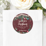 Festive Christmas lights pine branches snow  red Classic Round Sticker<br><div class="desc">This Christmas sticker features a classic and festive holiday design with pine branches adorned with ornaments, pinecones, white berries, and candy canes. Set against a rich dark red background with delicate snowfall accents, the sticker includes a personalised message of "Merry Christmas" and warm holiday wishes. The circular format makes it...</div>