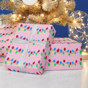 Festive Christmas String Lights on Pink Wrapping Paper