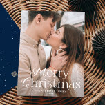 Festive Elegance Merry Christmas Navy Photo Holiday Card<br><div class="desc">Simple holiday card featuring your full-bleed vertical photo with "Merry Christmas" displayed in elegant white lettering. Personalise the elegant photo Christmas card with your family name and the year. The card reverses to display a navy background with subtle white dots.</div>