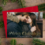 Festive Elegance Merry Christmas Red Photo Foil Holiday Card<br><div class="desc">Simple holiday card featuring your full-bleed horizontal photo with "Merry Christmas" displayed in elegant gold foil lettering. Personalise the foil photo Christmas card with your family name and the year. The card reverses to display a red background with subtle white dots.</div>