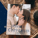 Festive Elegance Navy Merry Christmas Photo Holiday Card<br><div class="desc">Simple holiday card featuring your full-bleed vertical photo with "Merry Christmas" displayed in elegant navy lettering. Personalise the elegant photo Christmas card with your family name and the year. The card reverses to display a navy background with subtle white dots.</div>
