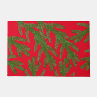 Festive Green Fir Tree Branches on Red Doormat