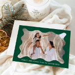 Festive Green Retro Photo Frame Merry Christmas Holiday Card<br><div class="desc">Send festive holiday greetings to your friends and family with this trendy holiday photo card! The simple Christmas card displays your horizontal photo framed in a wavy, dark green retro-style frame. Personalise the minimal holiday card with a custom greeting (shown as Merry Christmas) and your family name in white lettering....</div>