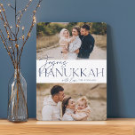 Festive Greeting | 2 Photo Joyous Hanukkah Holiday Card<br><div class="desc">Our festive and elegant Hanukkah card design is the perfect way to show off two of your favourite family photos. Design features "Joyous Hanukkah" in vibrant navy blue serif typography and hand lettered script,  along with your family name. Cards reverse to a white star pattern.</div>