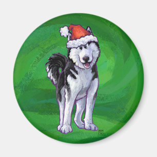 Festive Husky in Santa Hat on Green Magnet