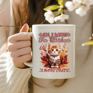 Festive kitten in autumn leaves coffee mug