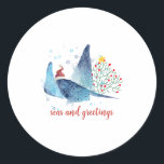 Festive Manta Ray Seas n Greetings Christmas Tree Classic Round Sticker<br><div class="desc">What a delightful gift for the ocean lover. A festive Christmas Manta Ray created in watercolor,  with a cute Santa Hat perched on his head. An underwater Christmas tree is lurking in the background! The  message reads Seas and Greetings in trendy script font,  but this can be easily changed.</div>