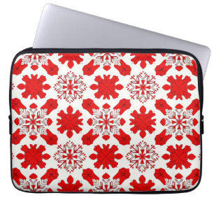 Festive Pattern of Red and White Snowflakes Laptop Sleeve