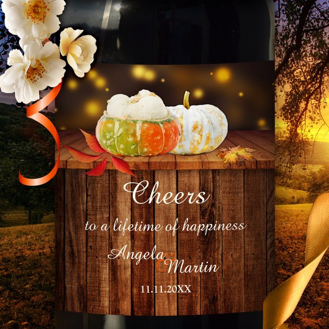 Festive Pumpkins Fall Wedding Wine Label (Festive colorful wine label featuring pumpkins and autumn leaves on rustic wood with sparkling light)