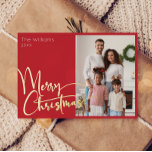Festive Script Red Photo Merry Christmas Gold Foil Holiday Card<br><div class="desc">Celebrate the season with this festive script red photo Merry Christmas gold foil holiday card featuring a touch of elegant charm. The chic design showcases a simple gold-and-red colour palette, evoking the cosy spirit of winter. Its modern and unique appeal and rustic wording create a perfect balance between luxury and...</div>