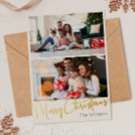 Festive Script Two-Photo Merry Christmas Gold Foil Holiday Card<br><div class="desc">Celebrate the season with this festive script two-photo Merry Christmas gold foil holiday card featuring a touch of elegant charm. The chic design showcases a simple gold-and-white colour palette, evoking the cosy spirit of winter. Its modern and unique appeal and rustic wording create a perfect balance between seasonal and contemporary....</div>