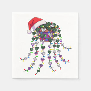 Festive Tropical Houseplant Wearing a Santa Hat Napkin