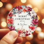 Festive Winter Florals Christmas  Classic Round Sticker<br><div class="desc">Elegant Christmas Stickers featuring winter florals - poinsettias,  in rich shades of red,  burgundy,  creams and ivory,  festive berries and lush greenery. All text is easy to customise.</div>