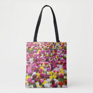 field full of tulips tote bag