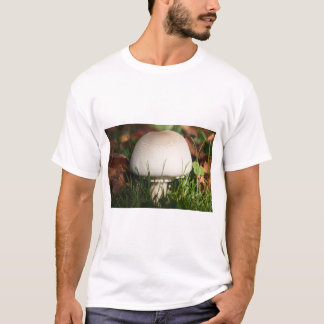 Field mushroom in grass T-Shirt