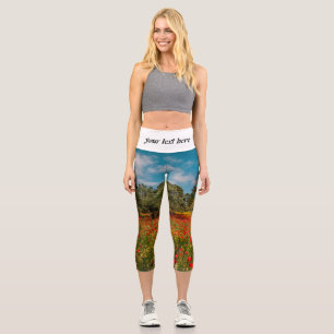 field with flowers and trees capri leggings