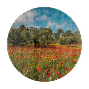 field with flowers and trees cutting board