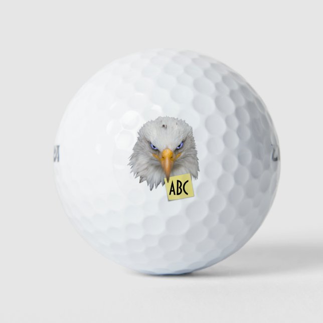 Fierce Looking Eagle Head Holding Monogram Note Golf Balls (Front)
