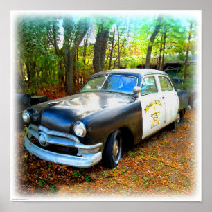 Fifties Highway Patrol Car in Junk Yard Weeds Poster