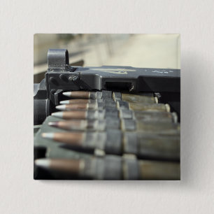 Fifty-calibre machine gun rounds 15 cm square badge