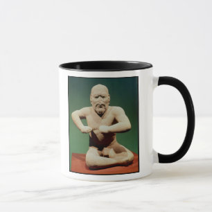 Figurine of a wrestler mug