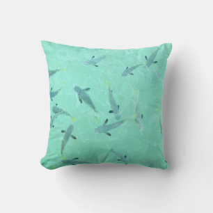 Fiji fish swimming in clear blue water cushion
