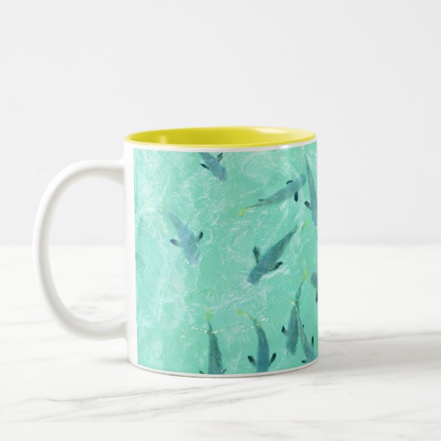 Fiji fish swimming in clear blue water Two-Tone coffee mug (Left)