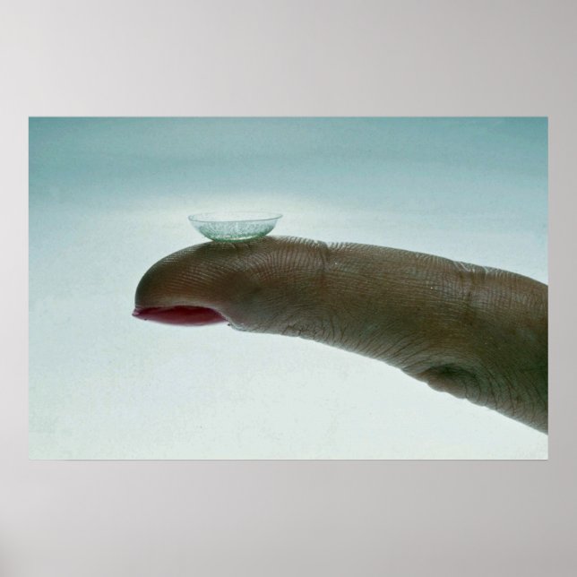 Finger holding a contact lens poster (Front)