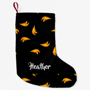 Fire sparks pattern on black small christmas stocking