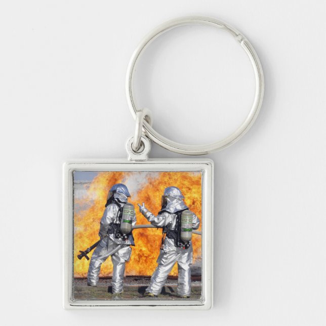 Firefighters battle a simulated fire key ring (Front)
