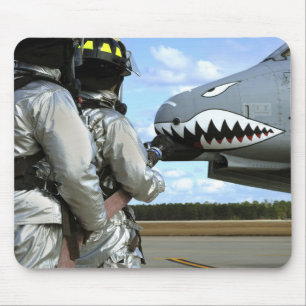 Firefighters deploy a fire hose during a drill mouse pad