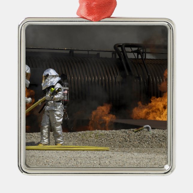 Firefighters neutralise a live fire metal ornament (Front)