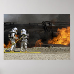 Firefighters neutralise a live fire poster