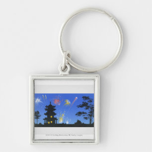 Firework display and silhouette of pagoda key ring
