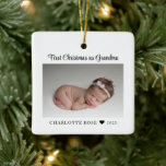 First Christmas as Grandma New Baby Photo Ceramic Ornament<br><div class="desc">Celebrate her first Christmas as grandma with this personalised photo Christmas tree ornament.  All text can be customised.  Add your own photo to create a truly unique gift for her first Christmas as a grandma.</div>