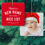 First Christmas baby photo cute red Ceramic Ornament<br><div class="desc">There's a new name on the nice list! Celebrate and remember baby's first Christmas with this cute one-photo personalised ornament. The front features a sweet type treatment with room for name and birth date and the back has a large photo. This keepsake ornament makes a great gift for new parents...</div>