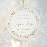 First Christmas Baby Photo Gold Wreath Ceramic Ornament<br><div class="desc">This design features a gold faux foil wreath of Christmas ornaments, holly berries and foliage, surrounding the words "My First Christmas" in gold-colored sans serif font. Customize the front with baby's name in whimsical gold-colored script, along with the family name and year in sans serif. Easily replace the sample photo...</div>