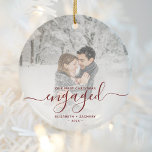 First Christmas Engaged Custom Photo Red Script Ceramic Ornament<br><div class="desc">Commemorate your engagement with this beautiful modern keepsake ornament. The dark red text reads "Our first Christmas engaged, " with the word "engaged" in elegant handwriting script with flourishes before and after. Replace the sample image with your favourite photo, and add your names and the year. A white gradient filter...</div>