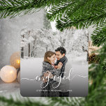 First Christmas Engaged Custom Photo White Script Metal Tree Decoration<br><div class="desc">Commemorate your engagement with this beautiful modern keepsake ornament. The white text reads "Our first Christmas engaged, " with the word "engaged" in elegant handwriting script with flourishes before and after. Replace the sample image with your favourite photo, and add your names and the year. A black gradient filter helps...</div>