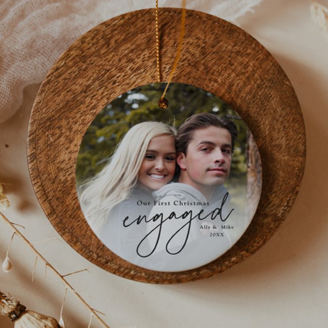First Christmas Engaged Handwritten Photo Ceramic Ornament (Elegant black script first christmas engaged 2 photo christmas tree holiday ornament.)
