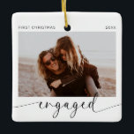 First Christmas Engaged Keepsake  Ceramic Ornament<br><div class="desc">Introducing the perfect Christmas ornament for the soon to be Mr and Mrs! This customisable ornament is the perfect way to celebrate your first Christmas together as an engaged couple. With a minimalist modern design and handwritten calligraphy, this ornament will look stunning on your tree. The best part? You get...</div>