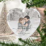 First Christmas Engaged Photo Green Script Heart Ornament<br><div class="desc">Commemorate your engagement with this beautiful heart-shaped keepsake ornament. The green text reads "Our first Christmas engaged, " with the word "engaged" in elegant handwriting script with flourishes before and after. Replace the sample image with your favourite photo, and add your names and the year. A white gradient filter helps...</div>