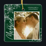 First Christmas Married Green Snowflakes Photo Ceramic Ornament<br><div class="desc">This square Christmas ornament is a perfect gift for the newly married couple. The design features a photo frame with handwritten text "Married" and is accented with light grey snowflakes on a dark green background. Personalise with a pictures of the couple,  their names and year.</div>