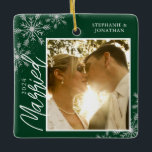 First Christmas Married Green Snowflakes Photo Ceramic Ornament<br><div class="desc">This square Christmas ornament is a perfect gift for the newly married couple. The design features a photo frame with handwritten text "Married" and is accented with light grey snowflakes on a dark green background. Personalise with a pictures of the couple,  their names and year.</div>