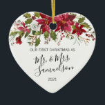 First Christmas Married Red Poinsettia Watercolor Ceramic Ornament<br><div class="desc">Elegant Christmas holiday  floral poinsettia ornament for first married Mr. and Mrs Name. Red,  white and green colours. Personalise them by adding your name.  Makes a perfect keepsake gift for your spouse (husband or wife). Heart Shape.</div>